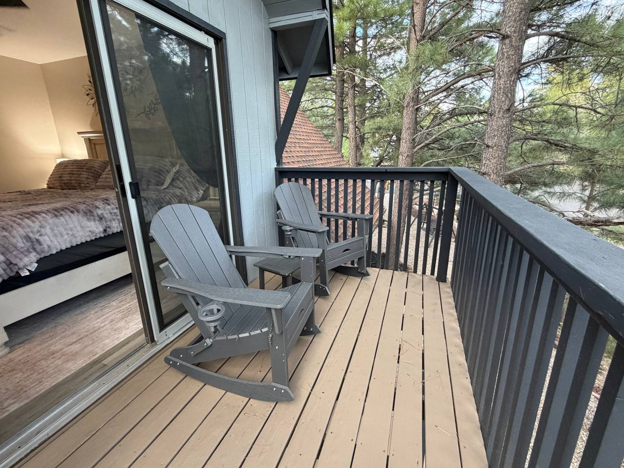 Private balcony with Adirondack rockers